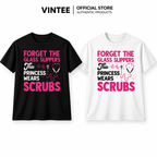 Black crewneck sweatshirt laid flat, showing the This Princess Wears Scrubs funny nurse graphic in pink